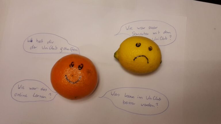 eine Orange mit lachendem Gesicht und eine Zitrone mit traurigem Gesicht stellen Fragen zum UniClub